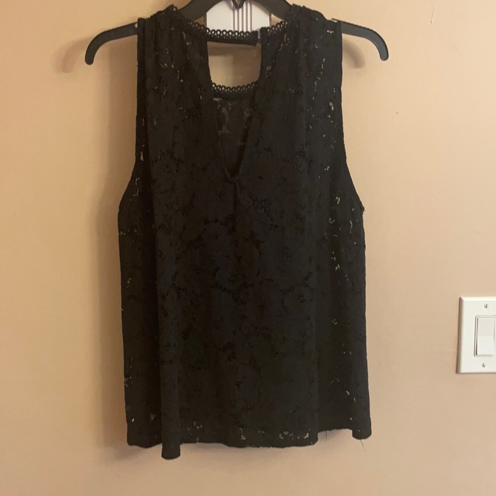 Sleeveless lace vest